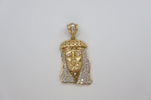 14k Jesus Piece Pendant featuring cubic zirconia (CZ) stones